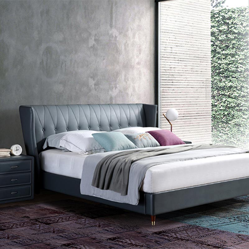 Lit en bois massif recouvert de cuir